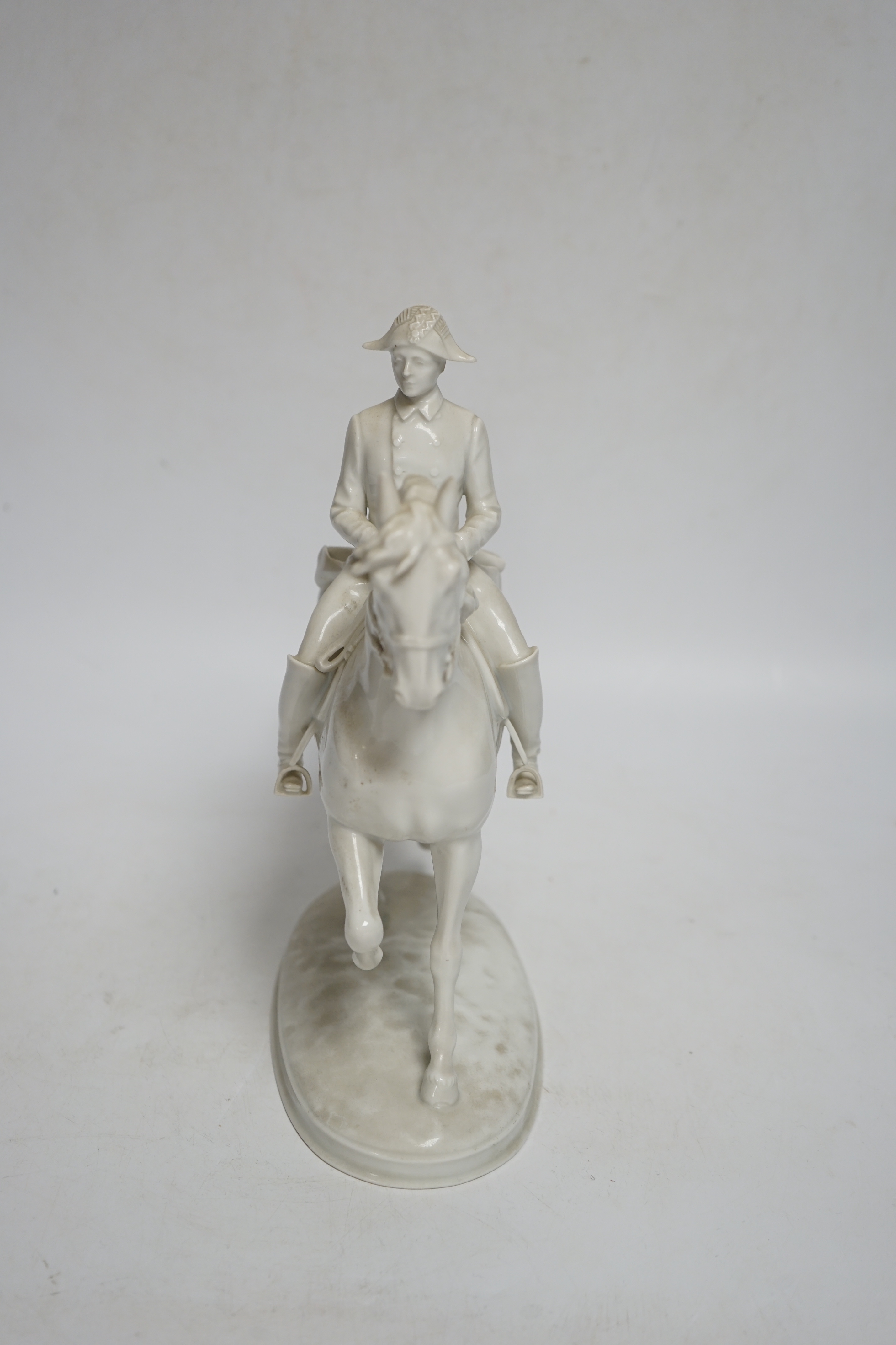 An Augarten, Wien white glazed porcelain Spanish Riding School Group, 24cm